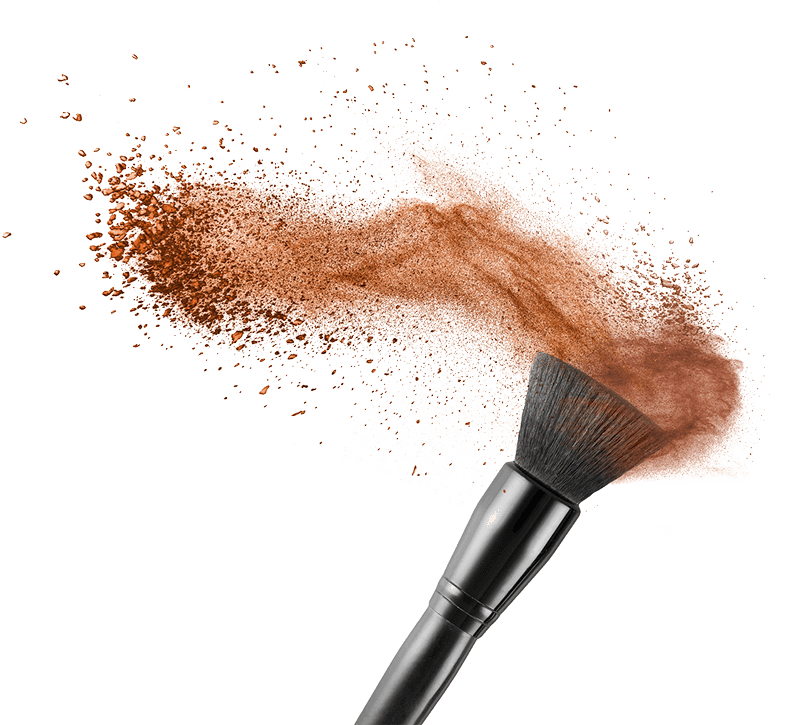 Makeup brush with makeup flying off it